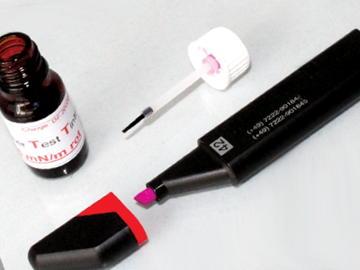 A set containing a surface energy test ink & a surface energy test pen